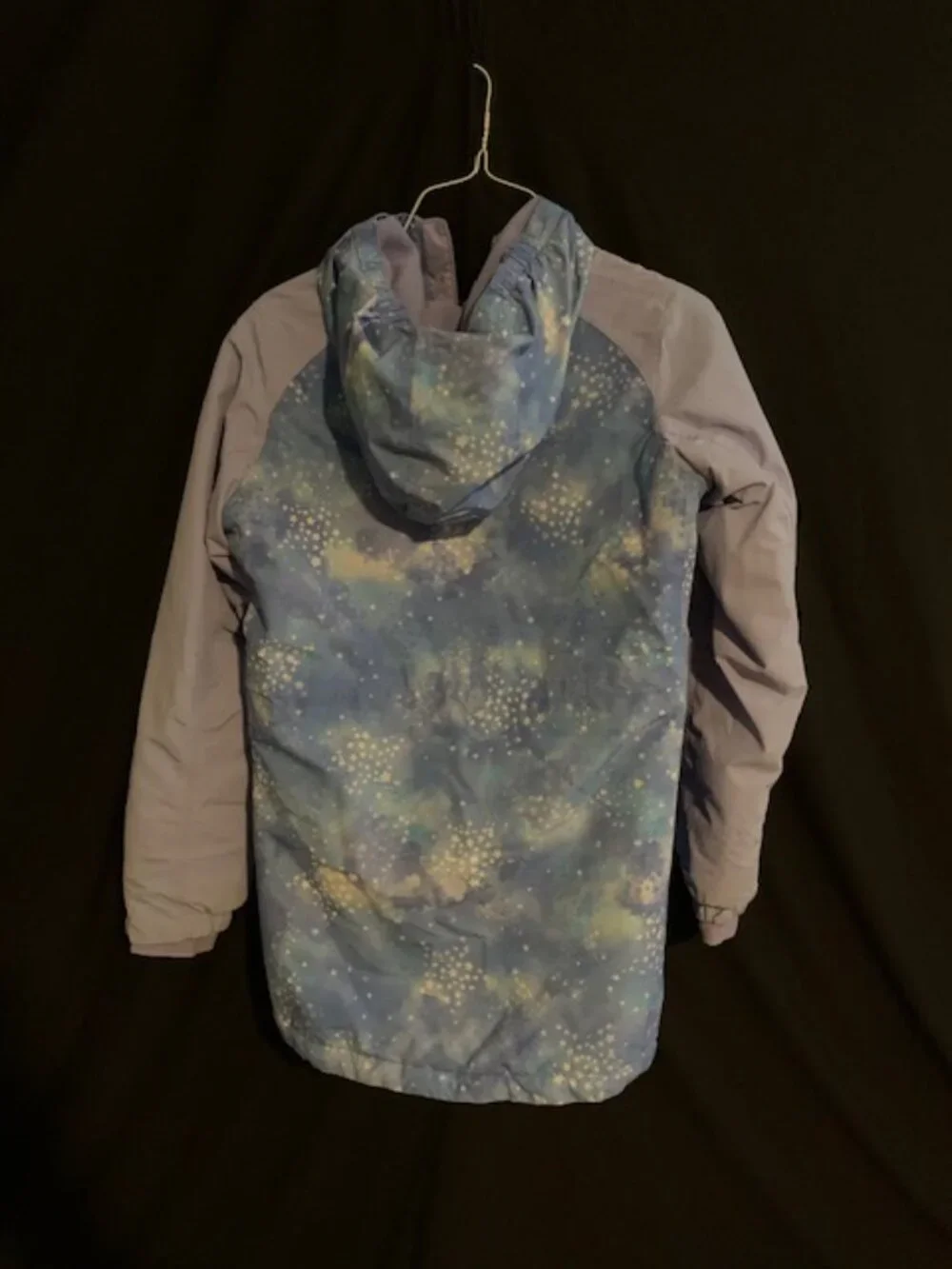 Winter Jacket with Blue‑Teal Pattern & Purple Sleeves – Bold & Cozy